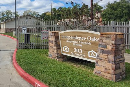 Sign for Independence Oaks housing.