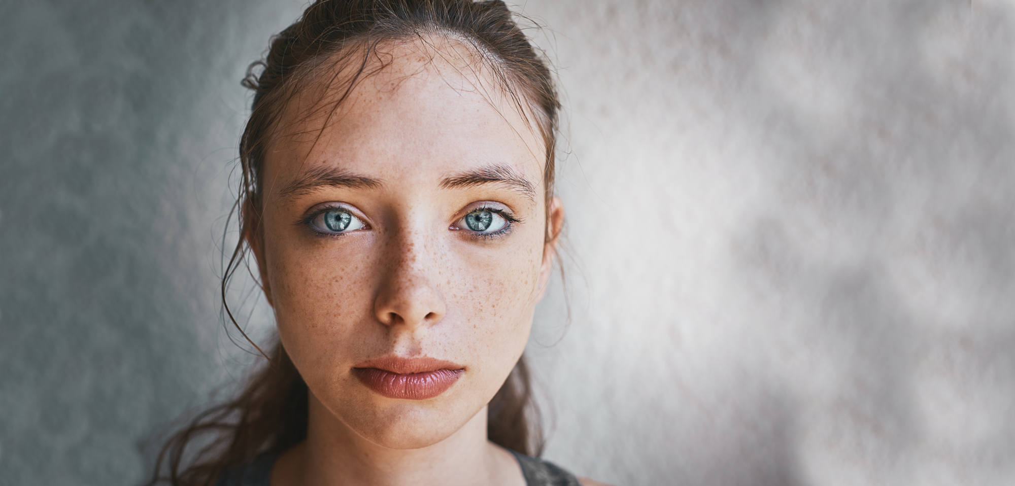 berunette-woman-with-striking-blue-eyes
